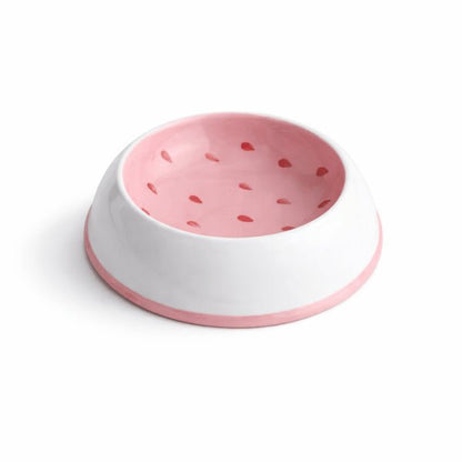 Gamelle chat céramique design fraise garde un repas propre dans un espace compact